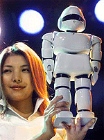 A toy version of humanoid robot Pino, designed by Japanese venture firm ZMP Inc, is shown during a demonstrations by Japanese toymaker Tsukuda Original Co Ltd in Tokyo on Friday.