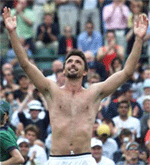 Croatias Goran Ivanisevic celebrates after beating Andy Roddick of the USA during their third round match at Wimbledon on Friday.