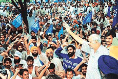 BSP supremo Kanshi Ram addresses party workers on the last day of their dharna in Chandigarh on Saturday.