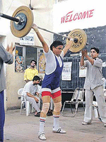 A weightlifter in action during the trials in Ludhiana to select Punjab probables for a camp for the National Games.