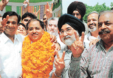 Mr Jagdish Arora with his supporters after being elected as president of the Chandigarh Beopar Mandal on Sunday. 