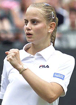 Jelena Dokic of Yugoslavia celebrates after beating Austria's Barbara Schett during their third round match at the Wimbledon Championships on Saturday.