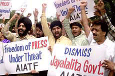 Activists of the All-India Anti Terrorist Front demonstrate against the arrest of mediapersons by the Tamil Nadu Government in New Delhi on Sunday. 