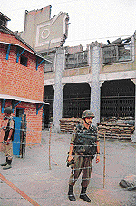 A part of the building of Palladium cinema in Lal Chowk area of Srinagar that was gutted in a fire in 1992 has been converted into a security camp.