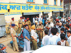 The scene outside Bank of Baroda in Ludhiana after the shooting incident on Monday.