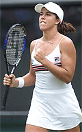 Jennifer Capriati of the U.S celebrates after beating Sandrine Testud of France in their fourth round match at Wimbledon on Sunday.