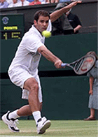 Pete Sampras of the U.S. plays a backhand return to Switzerland's Roger Federer at Wimbledon on Sunday.