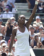 Venus Williams of the U.S celebrates after beating Nathalie Tauziat of France during her women's quarter finals match at Wimbledon on Tuesday. 