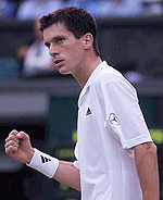 Britains Tim Henman celebrates beating Todd Martin of the US during his fourth round match at Wimbledon on Monday.