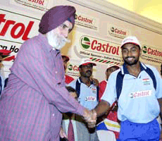 The Indian Hockey Federation President KPS Gill with hockey team captain Baljit Singh Dhillon on the eve of their departure for the pre-World Cup tour in New Delhi on Tuesday. 