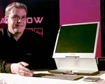 Compaq Asia Pacific employee Blair McKenzie displays a prototype of a personal computer that functions as a laptop or a desktop during a news conference in Mumbai on Wednesday. 