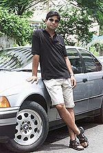 Bharat Thakur, a young New Age guru, wears dark glasses as he poses for a photograph in Mumbai on Monday. 