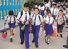 Students of Sacred Heart Senior Secondary School, Sarabha Nagar, come out of the school after taking classes on Wednesday.
