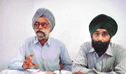 Mr Hardev Singh Ahluwalia and his son Gurdeep Singh talk to mediapersons in Ludhiana on Friday.