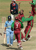 West Indies bowler Corey Collymore celebrates the dismissal of Indian opening batsman Sachin Tendulkar who was caught by Darren Ganga for a duck on Saturday in the final of the triangular One-Day International Series that included Zimbabwe at the Harare Sports Club.