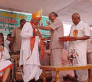 Haryana Chief Minister Om Prakash Chautala being honoured at a function organised on the 2600th birth anniversary of Bhagwan Mahavir at Ganaur in Sonepat district on Sunday.
