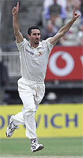 Australias pace bowler Jason Gillespie celebrates taking the wicket of Englands Alec Stewart on the fourth day of the Test in the Ashes Tour at Edgbaston on Sunday.