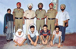 The accused (sitting from left)  Gurjeet Kaur, Nihal Singh, Gurjit Singh, Sikander Singh. The faces of the main accused have been encircled.