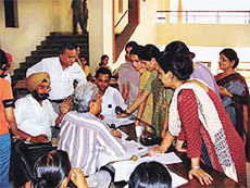 Candidates for the BCA (reserved) course, teachers and principals deliberate over admission rules in the Khalsa College for Women, Civil Lines, Ludhiana, where centralised admissions began on Wednesday. 