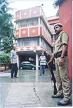 Plain cloths and armed policemen on vigil outside the residence of Indian cricket captain Saurav Ganguly in Kolkata following threats from Pakistan-based militant outfit Lashkar-e-toiba.