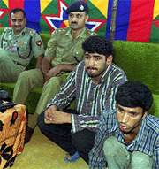 Two culprits involve in Cherar-e-Sharief blast, in which six women were killed and 75 injured in the month of June, 2001, in picture DIG Kashmir K. Rajindera and SSP Budgam Mr. Ashiq Bukhari are also seen.