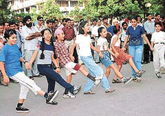 Schoolchildren present a street play - "Daantate Raho" in Chandigarhs Sector 17 on Saturday.
