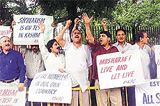 Activists of the All-State Kashmir Pandits Conference hold a demonstration against Pakistani President Pervez Musharraf at Jantar Mantar in New Delhi on Saturday.