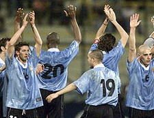Members of the Uruguayan national soccer team celebrate their victory over Bolivia in their first match of the Copa America played in Medellins Atanasio Girardot Stadium on Friday. 