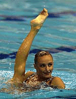 Russia's Olga Brusnikina displays a form during women's synchronized swimming solo technical routine in the 9th FINA World Swimming Championships in Fukuoka, western Japan, on Monday. 