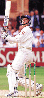 England batsman Domonic Cork looks up as he hits a six during the second day's play of the second Ashes test at Lord's, London on Friday. 