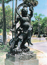 The Guardian of Heaven figure from China guards the museum.