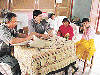 Dr Deswal and Mr Khan with psychotic patients at Mother Teresa’s home.