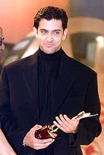 Indian superstar Hrithik Roshan holds his award during an award ceremony in the eastern Indian city of Calcutta on Saturday.