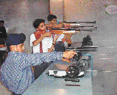 Shooters participate in the 10th Ludhiana District Shooting Championship which began at the Master Tara Singh Memorial College on Friday. 
