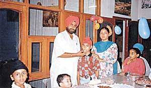 Hardev Singh with members of his family during happier times.
