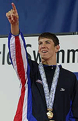 Michael Phelps of the USA acknowledges the crowd after receiving his gold medal for the mens 200m butterfly at the 9th World Swimming Championships in Fukuoka on Tuesday.