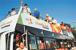 UT Administrator, Lt Gen ( retd) JFR Jacob, captured in a jubilant mood on the occasion of the flagging off ceremony of Hop on Hop off tourist coach at Sukhna Lake in Chandigarh on Wednesday.