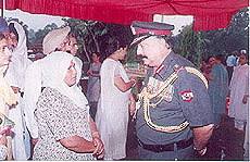 Lieut Gen. Shantanu Choudhary, GOC II Varsa Corps, listens to grievances of widows of Kargil martyrs on Kargil Vijay Divas in Jalandhar on Thursday.