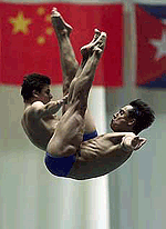 Fernando Platas and Eduardo Rueda of Mexico perform to capture the silver medal in the men's synchro platform diving final at the 9th FINA World Swimming Championships in Fukuoka