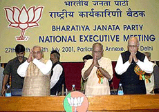 Prime Minister A.B. Vajpayee, BJP president Jana Krishnamurthy and Union Home Minister L.K. Advani at the BJP national executive meeting in New Delhi on Friday.