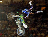 US rider Mike Jones flies through the air to win the Motocross Freestyle "Red Bull XFighters" competition.