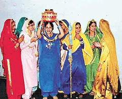 Girls from RS Model School perform giddha.