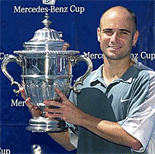 Andre Agassi holds up his trophy after his win over Pete Sampras in the finals of the Mercedes-Benz Cup, on Sunday in Los Angeles.
