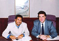 Sachin Tendulkar being signed on by fiat India Managing Director.