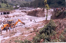 Resotration work being undertaken at Luni, where the bridge connecting Baijnath and Deol has been washed off due to flash floods.