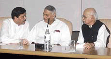 Union Finance Minister Yashwant Sinha having a discussion