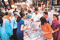 Buying threads that bind: Women flock a market to hunt for the most impressive rakhis in Chandigarh on Friday 