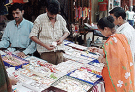 Sisters buying rakhis.