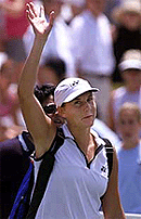 Seventh ranked Monica Seles waves to fans.