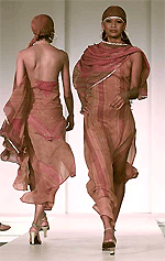 Models display clothes by Indian designer Ritu Kumar.
